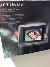 OPTIMUS 9 DIGITAL PHOTO FRAME W/REMOTE, CLEAR/BLACK FRAME, NEVER USED.