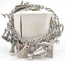 Vintage Sterling Silver 23 different flat & 3 Dimensional Charms Travel Bracelet