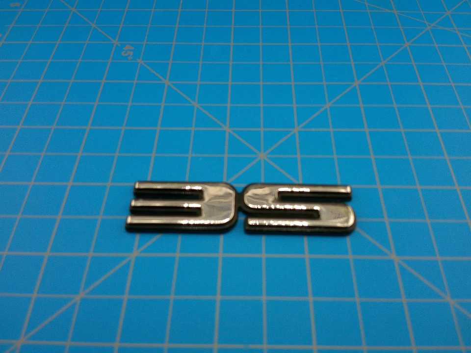 Emblema emblema GM SE 22657237 acabamento cromado original do fabricante para Chevy Pontiac Oldsmobile - Imagem 4 de 4