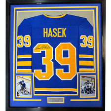 Framed Autographed/Signed Dominik Hasek 35x39 Buffalo Blue Hockey Jersey BAS COA