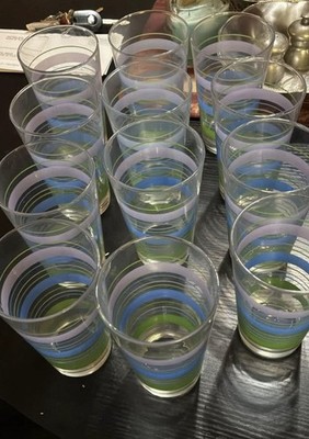 12 vintage Libbey glass tumblers with pastel blue, green, and purple stripe