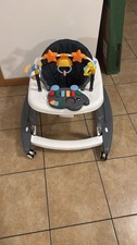 Andador para bebes con centro de actividades musical practicamente nuevo