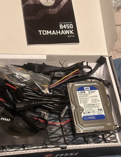 Lotto MSI B450 Tomahawk - HDD da 1 TB WD, cavi, manuale - NO MOBO - venduto così com'è - Foto 3 di 4