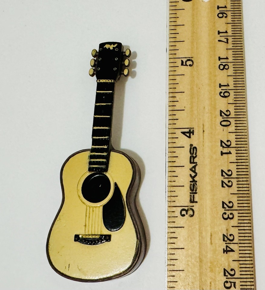 The Honky Tonk Man's guitar accessory is a tiny, hyper-specific WWF Hasbro relic that any wrestling figure collector would hunt for years.