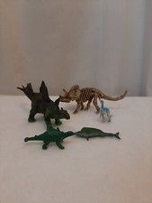 Lot of 4 Plastic Dinosaurs 1 Shark Figures Triceratops Stegosaurus Velociraptor