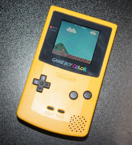 Nintendo Game Boy Color Yellow Console + Super Mario Bros Deluxe Game Tested