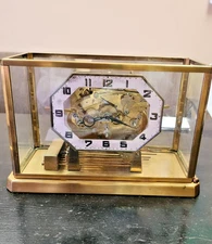 skeleton clock, cuckoo clock mfg clock, wesminster chime clock