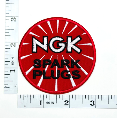 Coppia Toppe Motorsport NGK Spark Plugs - Cucito O Stiro - Distintivi Stoffa - Nuovi - 2