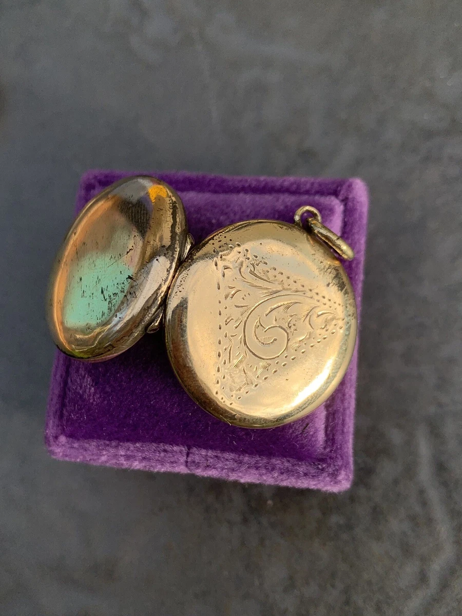 Pinchbeck locket deals