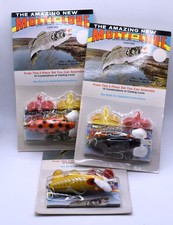The Amazing New Multi-Lure - 3 Different Colors of Casting Fishing Lures NIP