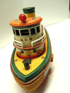VINTAGE 1950's TIN BATTERY OP. TUG BOAT NEPTUNE . MYSTERY  & SHAKE ACTION .WORKS