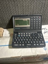 Sharp YO-430 64KB Electronic Organizer Vintage Digital PDA Calculator