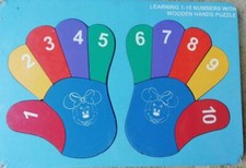Learning 1-10 numbers with wooden hands puzzle. wooden puzzles for children