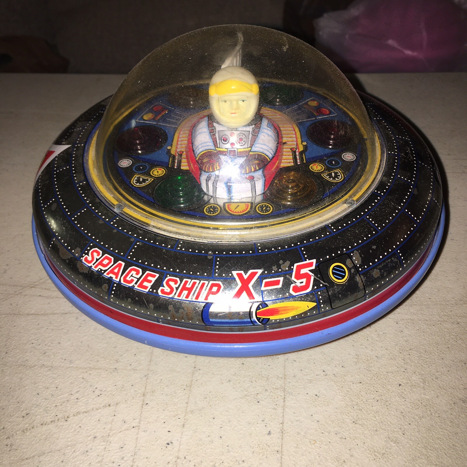 Vintage MT Japan Battery Powered Flying Saucer Pilot Tin Toy Space