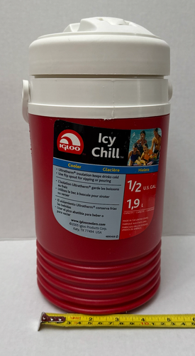 White vintage NWT Igloo 1/2 gallon Icy Chill Cooler with black logo, red and blue insulated walls, made in USA.