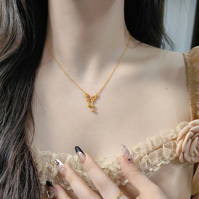 Exquisite Goldkette mit Schmetterling und goldenen Bohnen Designmerkmale