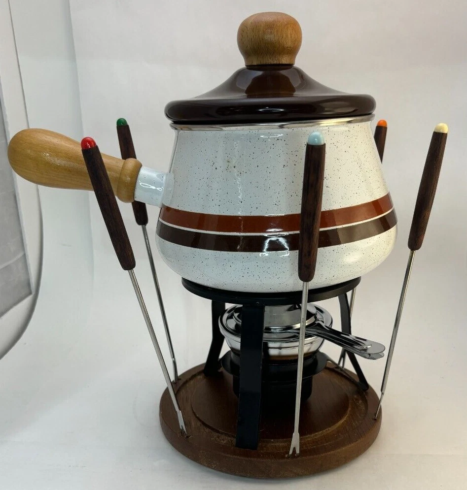 Fondue Pot w Wood Base 6 Color Coded Forks, Removable wood handle, cookbook, lid
Opens in a new wind
