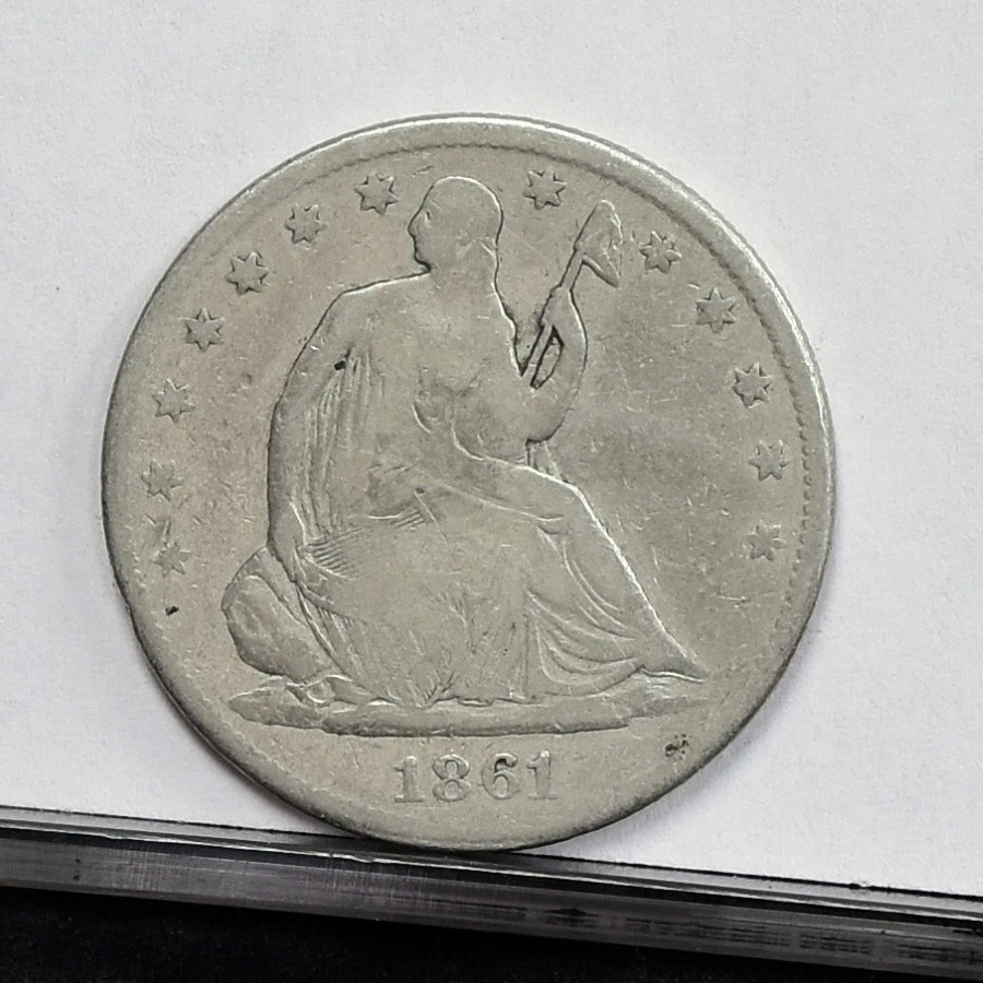 1861 Year Silver Seated Liberty US Half Dollars (1839-1891) for