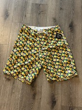 BRAND NEW STUSSY Logo Mens Board Shorts Swim Trunks Flowers Size 32 Black Yellow