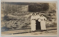 Vintage Postcard RPPC Women Posing on Railroad Tracks AA24