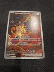 Team Rocket's Meowth 203/182 Sv10: Destined Rivals Holo