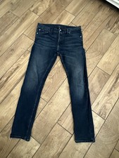 Pantalones de mezclilla ajustados para hombre Calvin Klein W34 L32