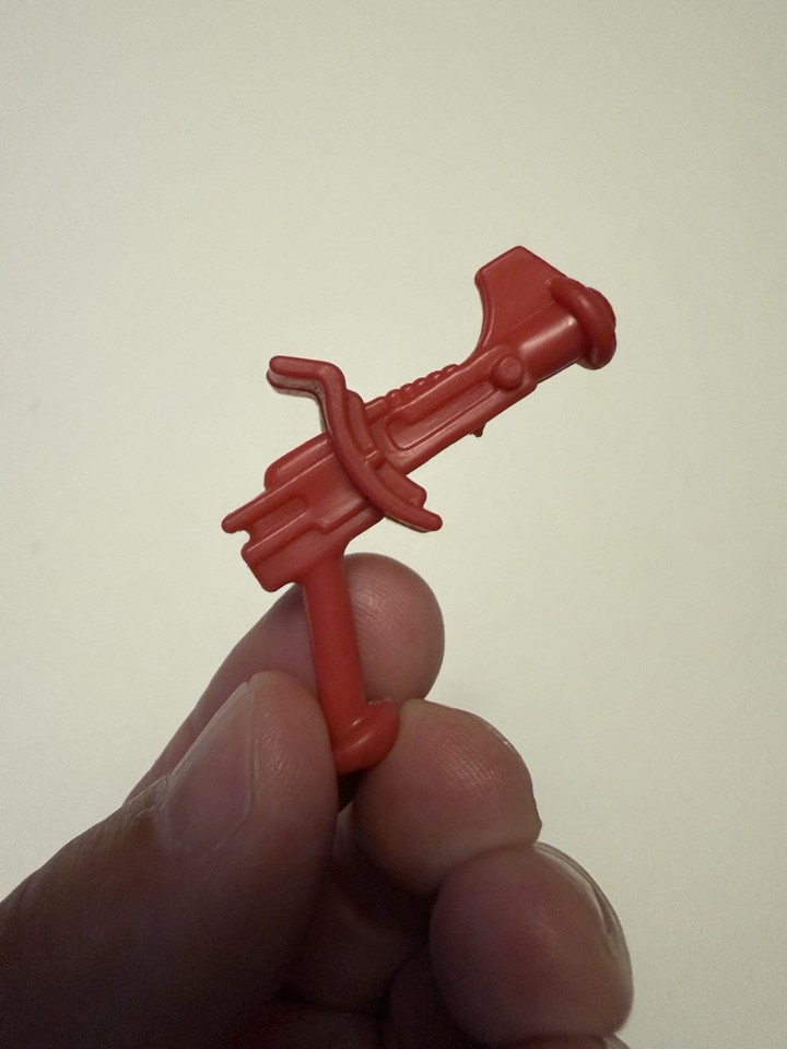 A KO knock-off Flexatron weapon from the He-Man era is a delightfully obscure piece of 80s toy history — the kind of deep-cut find only a true collector would recognize.