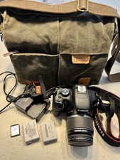 Canon EOS 550D 18.0MP Digital SLR Camera with EF-S IS 18-55mm Lens - Black+ bag 
