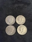 lot of 4 silver half dollars