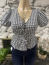 Image of Gingham Puff Sleeve Tie Front Blouse Ruffle Accent V-Neck Black White Women