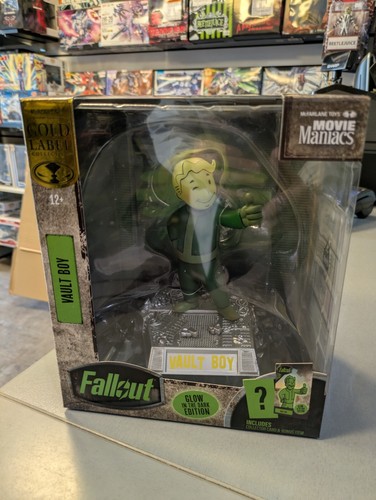 Figura posada McFarlane Fallout Vault Boy Glow in The Dark Edition etiqueta dorada 5 pulgadas
