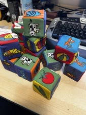 Foam Toy Blocks - brightly colored with images of animals, insects and cars.