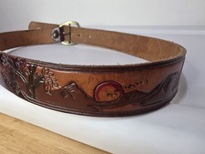 vintage hand-tooled leather belt intricate carved sunset landscape design