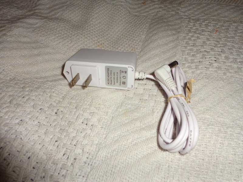 ac/dc adapter model TX-17051 output 24v-0.65a untested