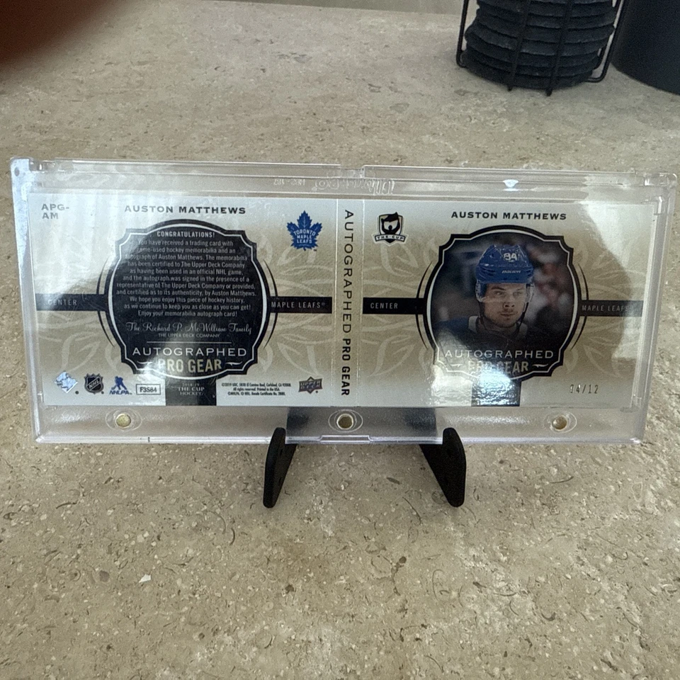 2018-19 UD The Cup Hockey Auston Matthews pro Gear Patch Auto Booklet /12 - Image 2 of 2