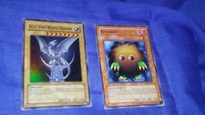 TWO YU-GI-OH CARDS BLUE EYES WHITE DRAGON IS-LIMITED ED-KURIBOH-IS FIRST EDITION