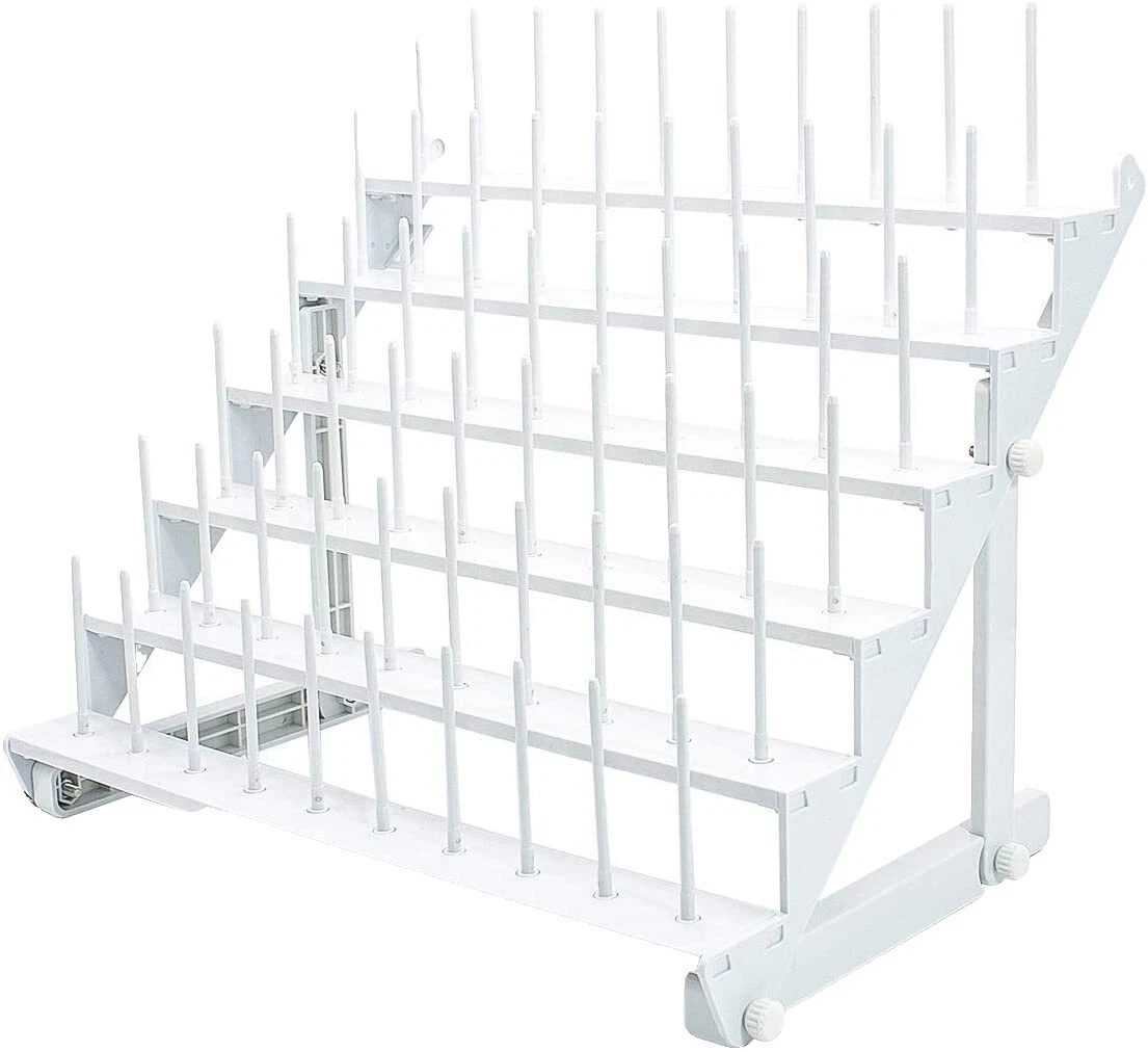 Cajas de costura de metal blanco y almacenes