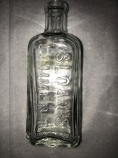 SLOAN'S LINIMENT   MADE  IN  USA  BOTTLE 5'' TALL  NUMBER 14 cork top