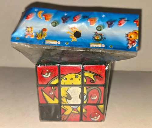 Vintage Pikachu Pokemon Rubiks Cube, New in package,photos & descript for damage