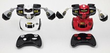 Sharper Image RC Robot Combat, LED  Sound Includes 2 Battle Robots  2 Controls