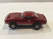 Vintage Aurora T-Jet  67 Candy Red Camaro SS open rivet chassis.