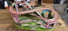 This item is a vintage J. Chein & Company tin litho roller coaster toy, popular