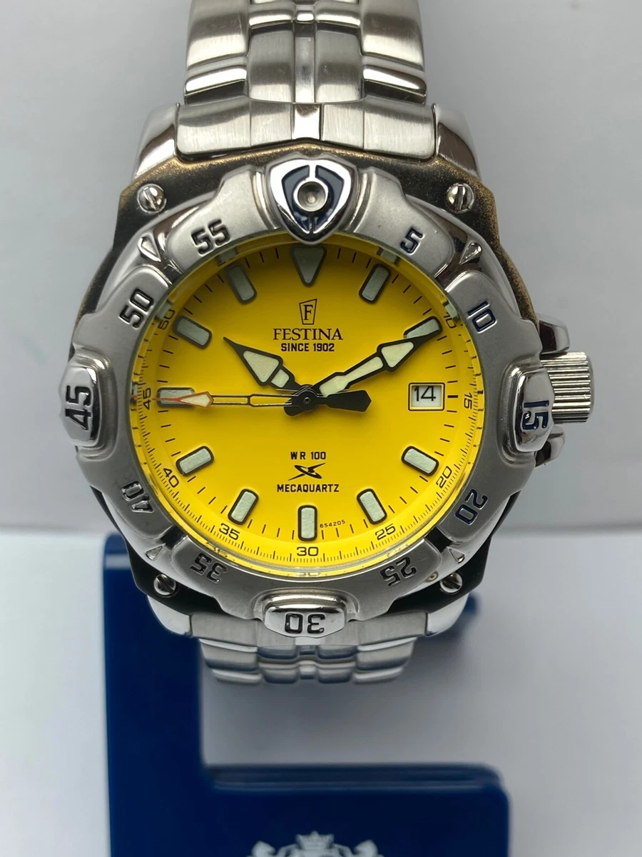 Montre festina cadran jaune sale