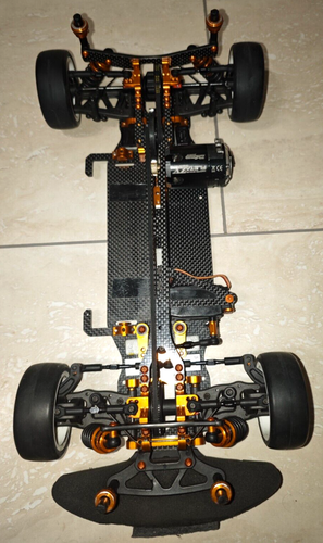 Team Xray T4 mit Motor, Servo, Reifen, + Ersatzteilspender Chassis, Tuningteile - Bild 7 von 12
