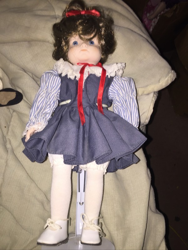 Vintage 13 inch porcelain Doll with stand