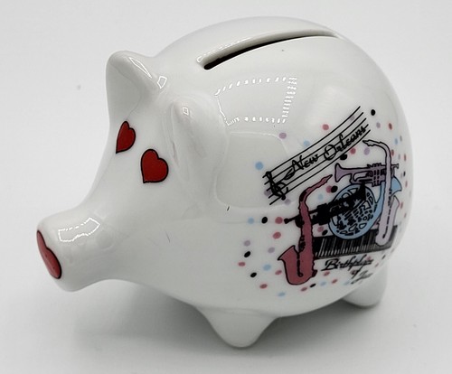 Small ceramic pig bank, New Orleans souvenir art on one side. Rubber stopper. - Picture 1 of 3