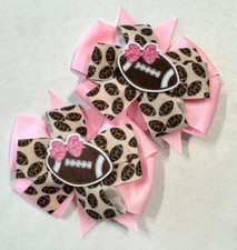 Beautiful Football with Pink Bow Set of Pigtail hair bows for girls.