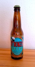 Strokes Bierflasche gefüllt mit Holz Golf Te...