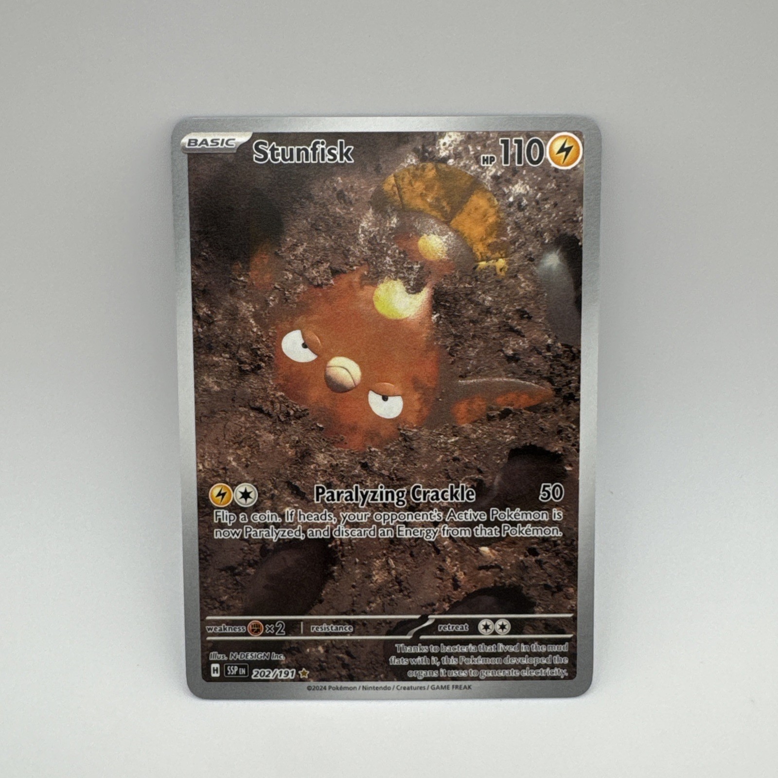 Stunfisk 202/191 Sv08: Surging Sparks Holo