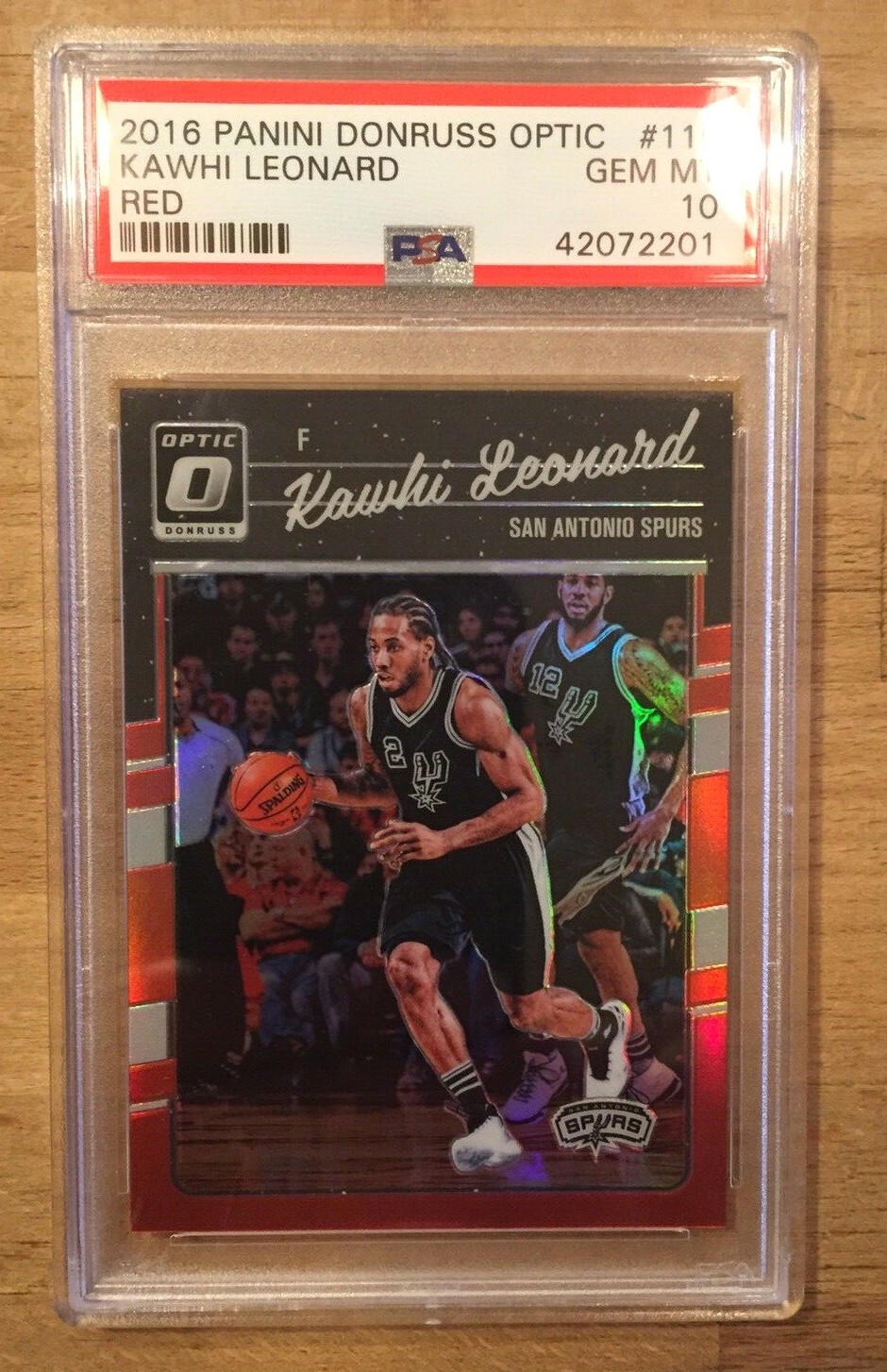 Kawhi Leonard 2016-17 Optic Red Prizm /99 PSA Gem Mint 10 (1st Optic) Clippers